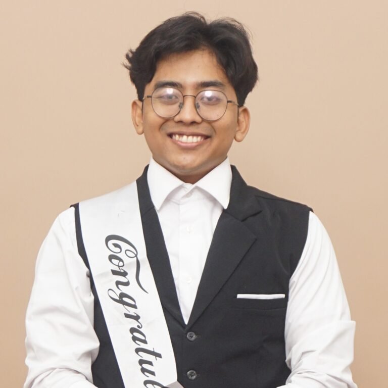 Export business professional confidently representing an Indonesian charcoal export company.